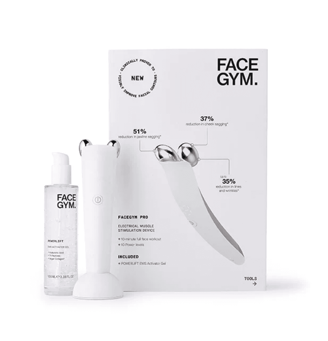 The new FaceGym Pro (2026), smooth-head device on its charging stand